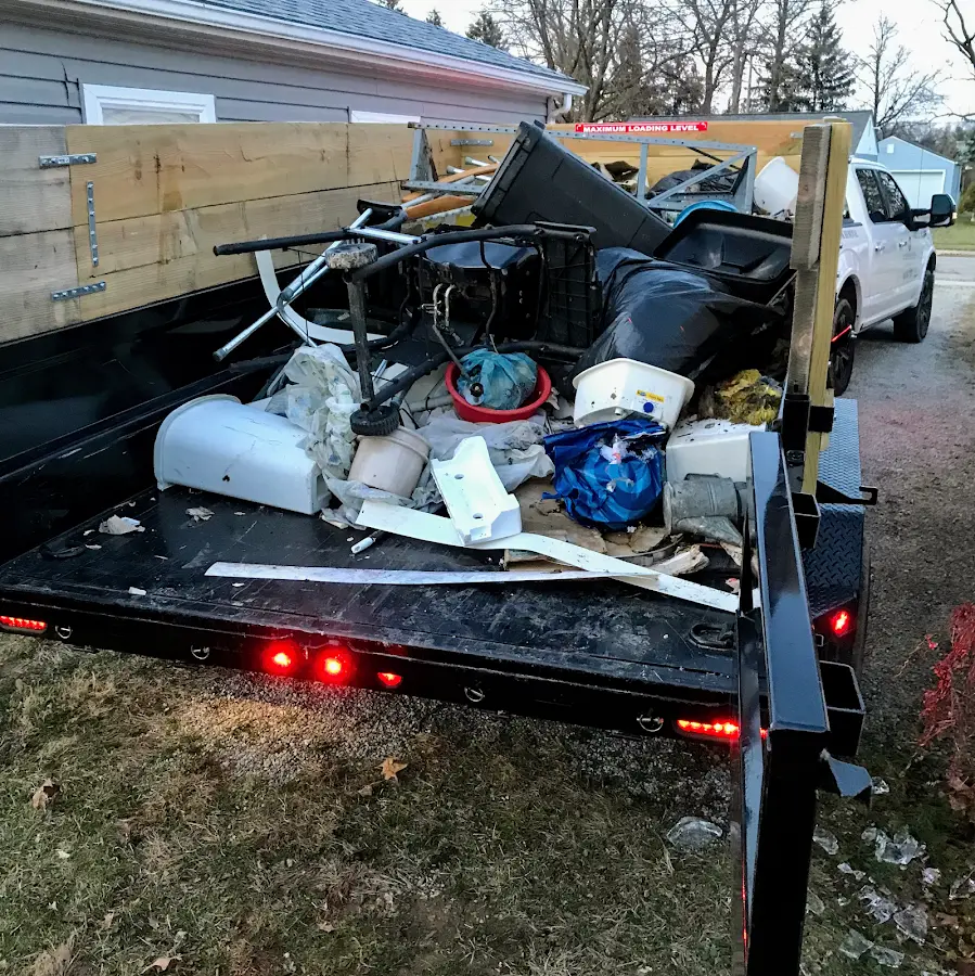 Roll-off dumpster delivered to a residential driveway in Little Silver